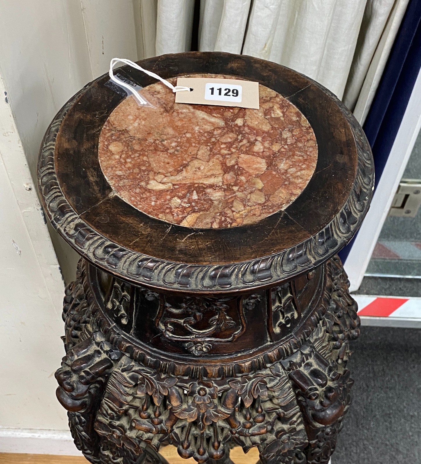 A Chinese carved hardwood marble topped vase stand, height 104cm